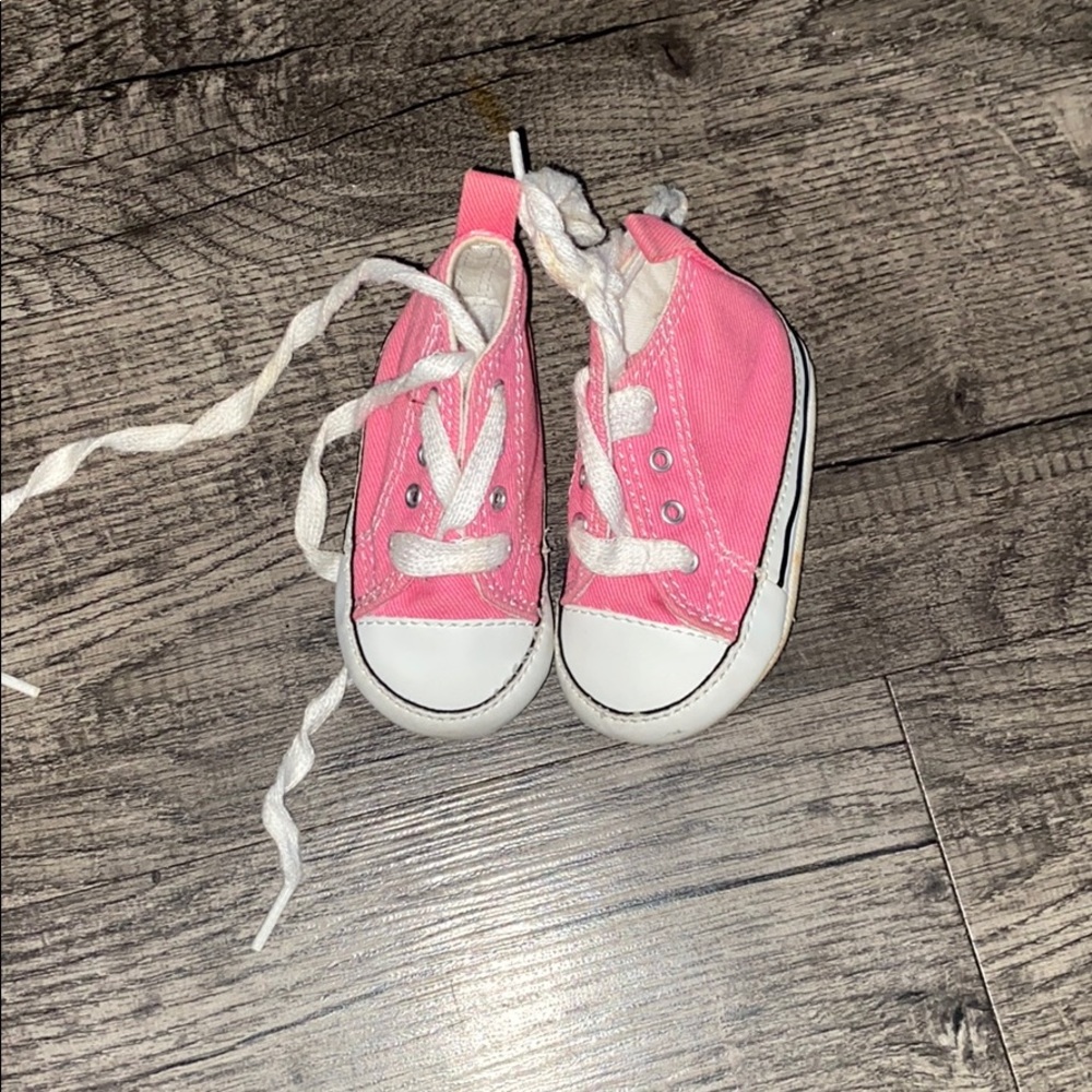 Pink and white converse
